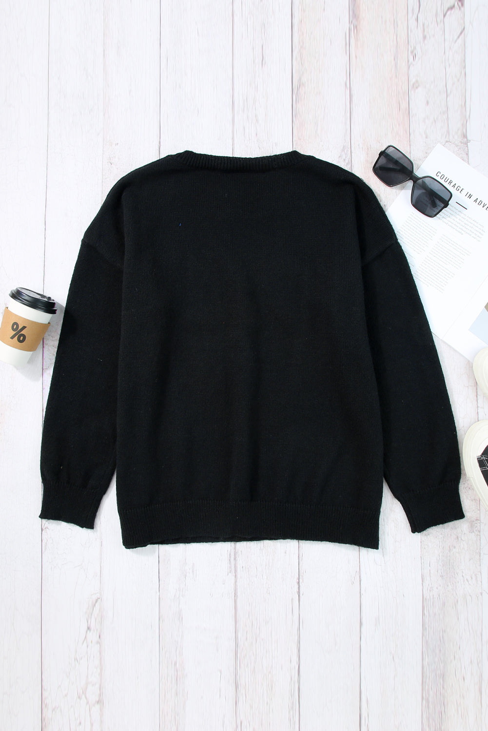 A Black Tinsel Holly Jolly Round Neck Knit Sweater