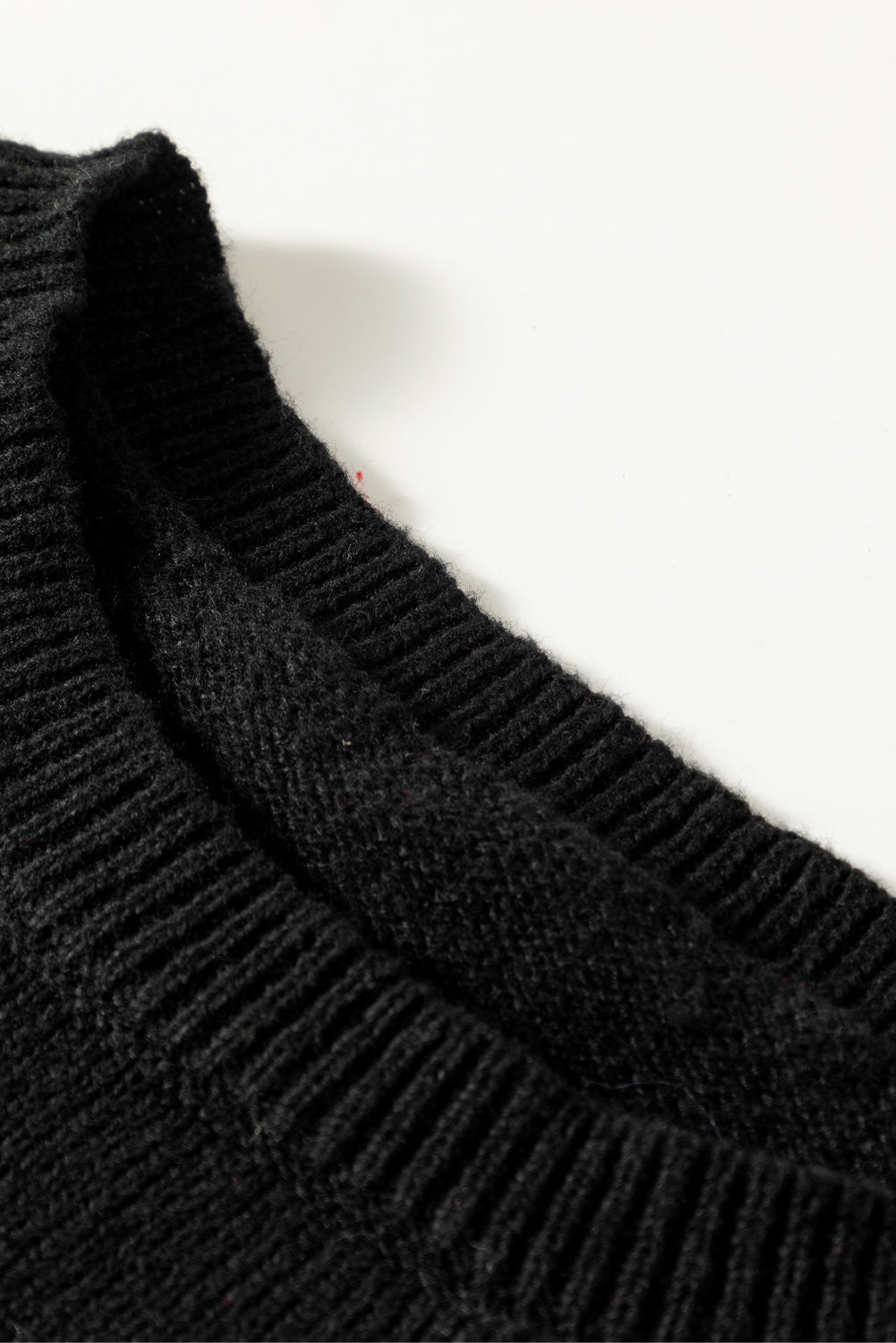 A Black Tinsel Holly Jolly Round Neck Knit Sweater